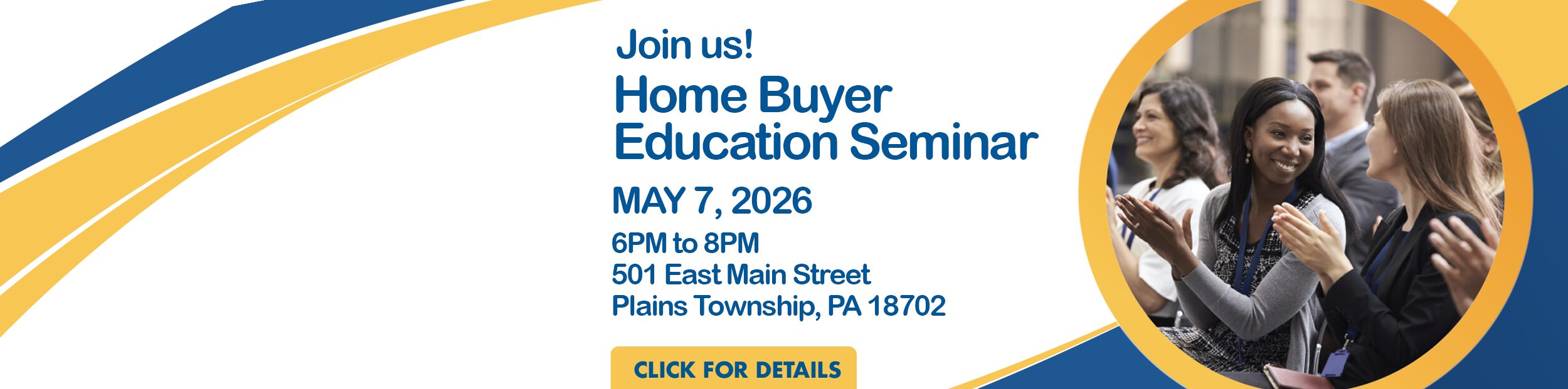 Group of people at a convention watching a speaker.