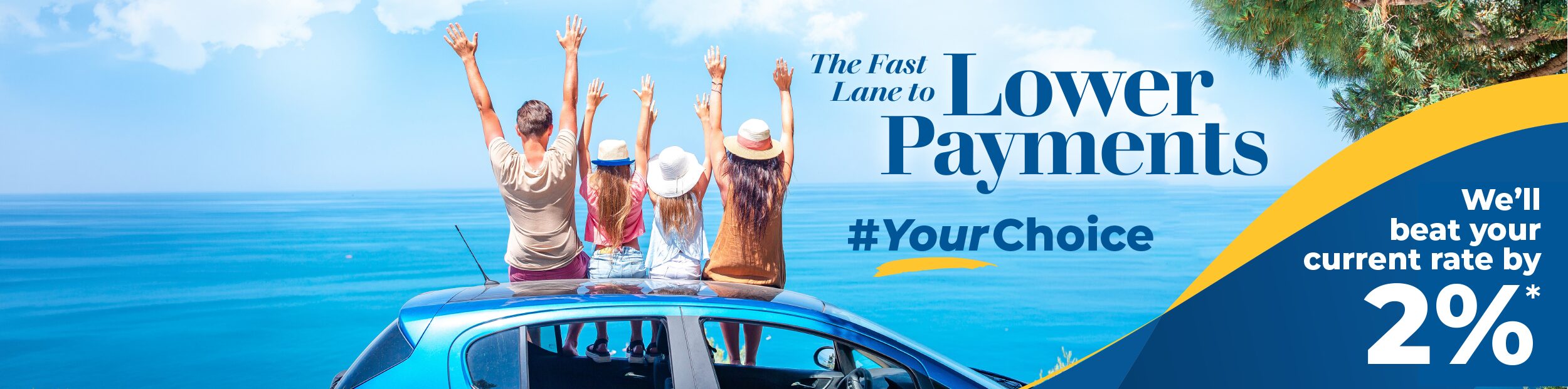 Family sitting on the hood of their car at the beach with their arms up in the air.